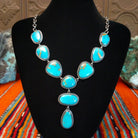 Kingman turquoise set in twisted rope bezels linked together to form the necklace.