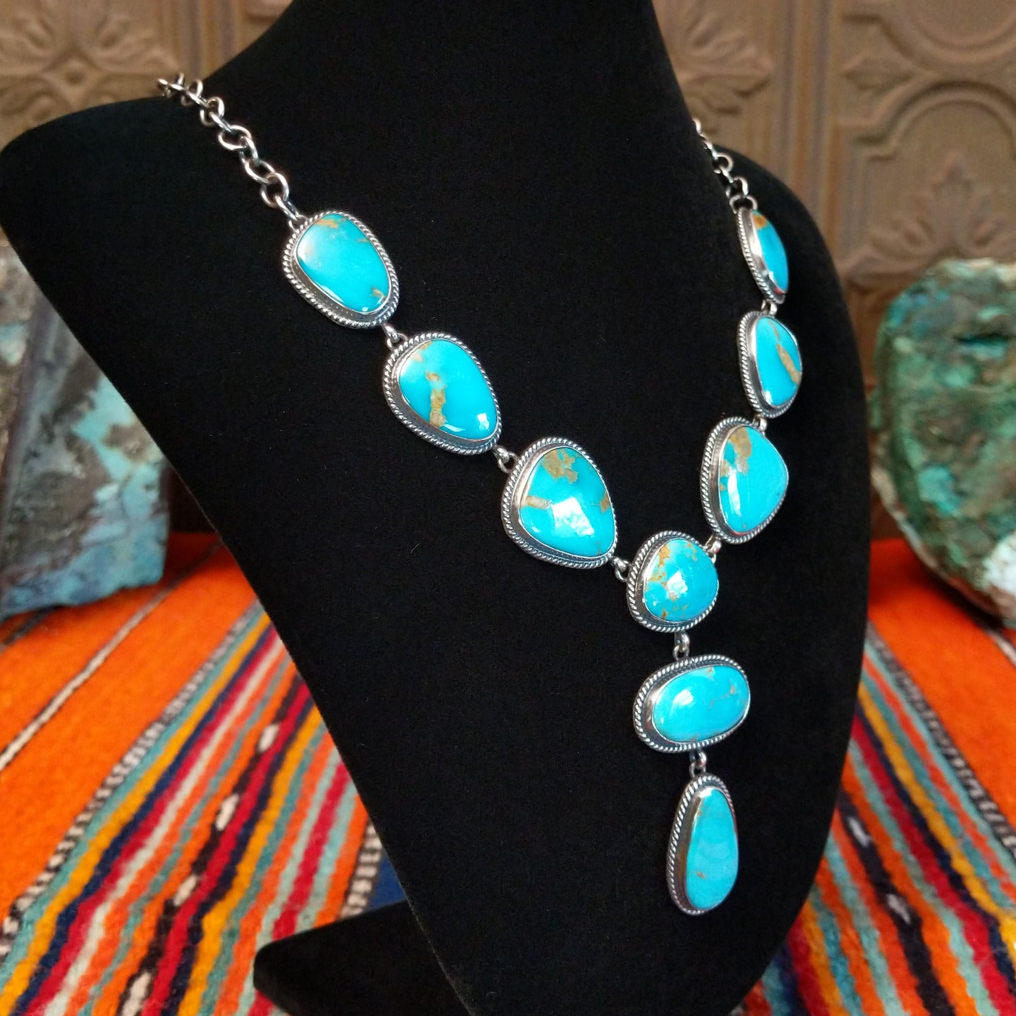 Kingman turquoise set in twisted rope bezels linked together to form the necklace.