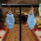 Close-up of the artisan's stamped initials.