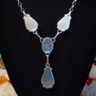 Sterling silver necklace with kingman turquoise set in the bezels, framed by twisted rope and dotted accents.