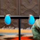 Sterling silver earrings with Kingman turquoise set in the oblong bezels.
