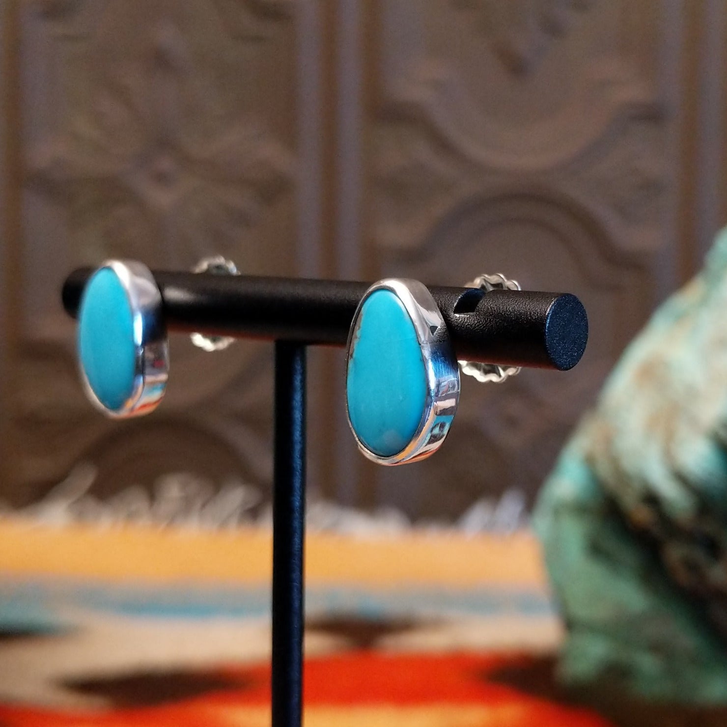 Sterling silver earrings with Kingman turquoise set in the oblong bezels.