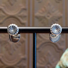 Close-up of the artisan's stamped signature.