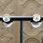Close up of the artist's stamped signature.