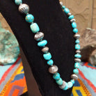 Kingman turquoise necklace with alternating turquoise beads and fluted sterling silver beads