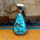Sterling silver pendant with Kingman turquoise set in the teardrop bezel.