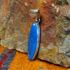 Sterling silver navette pendant with lapis set in the bezel.