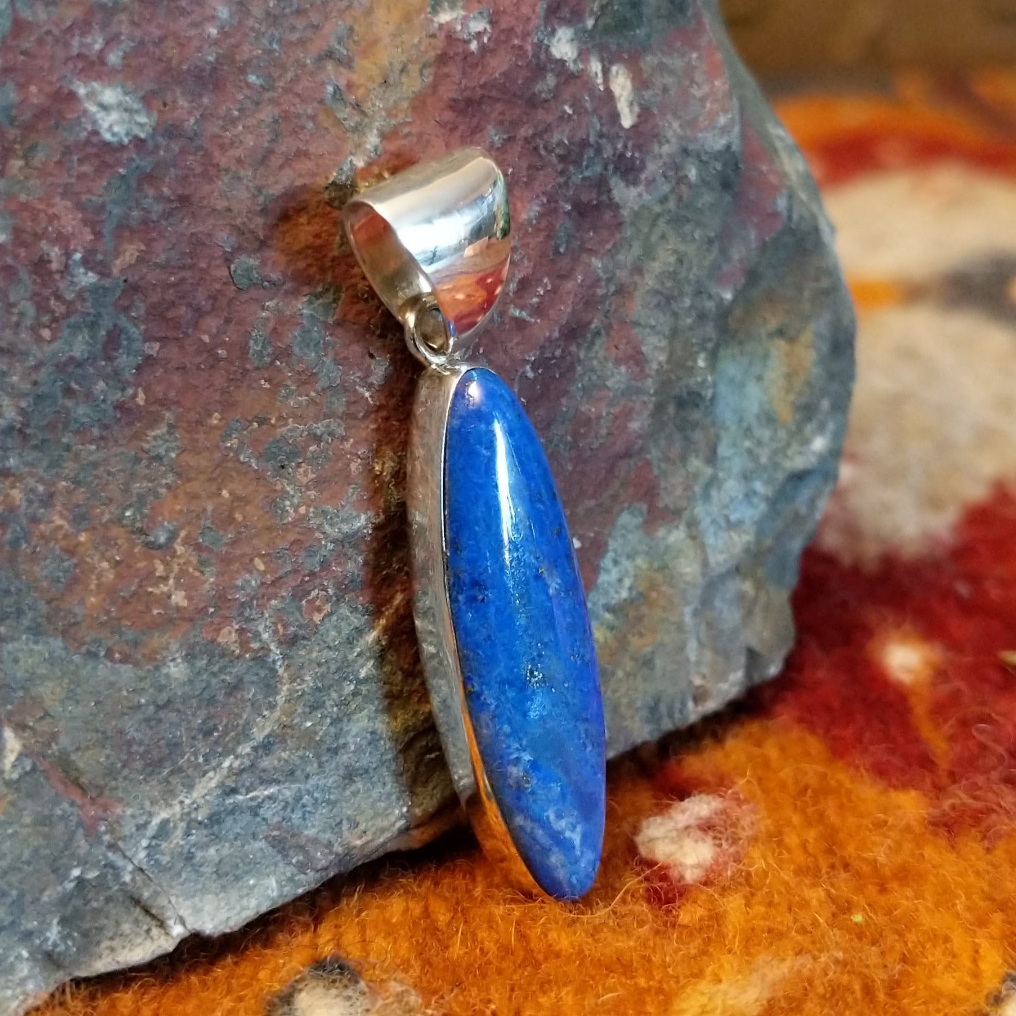 Sterling silver navette pendant with lapis set in the bezel.