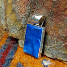 Rectangular sterling silver pendant with lapis set in the bezel.
