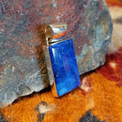 Rectangular sterling silver pendant with lapis set in the bezel.