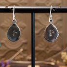 Close-up of the artisan's stamped signature.