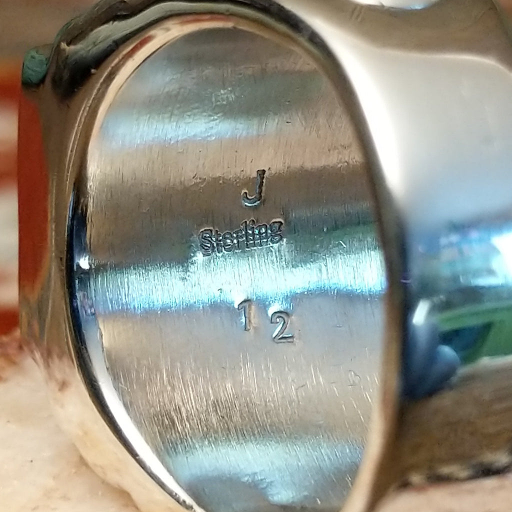 Close-up of the artisan's signature.