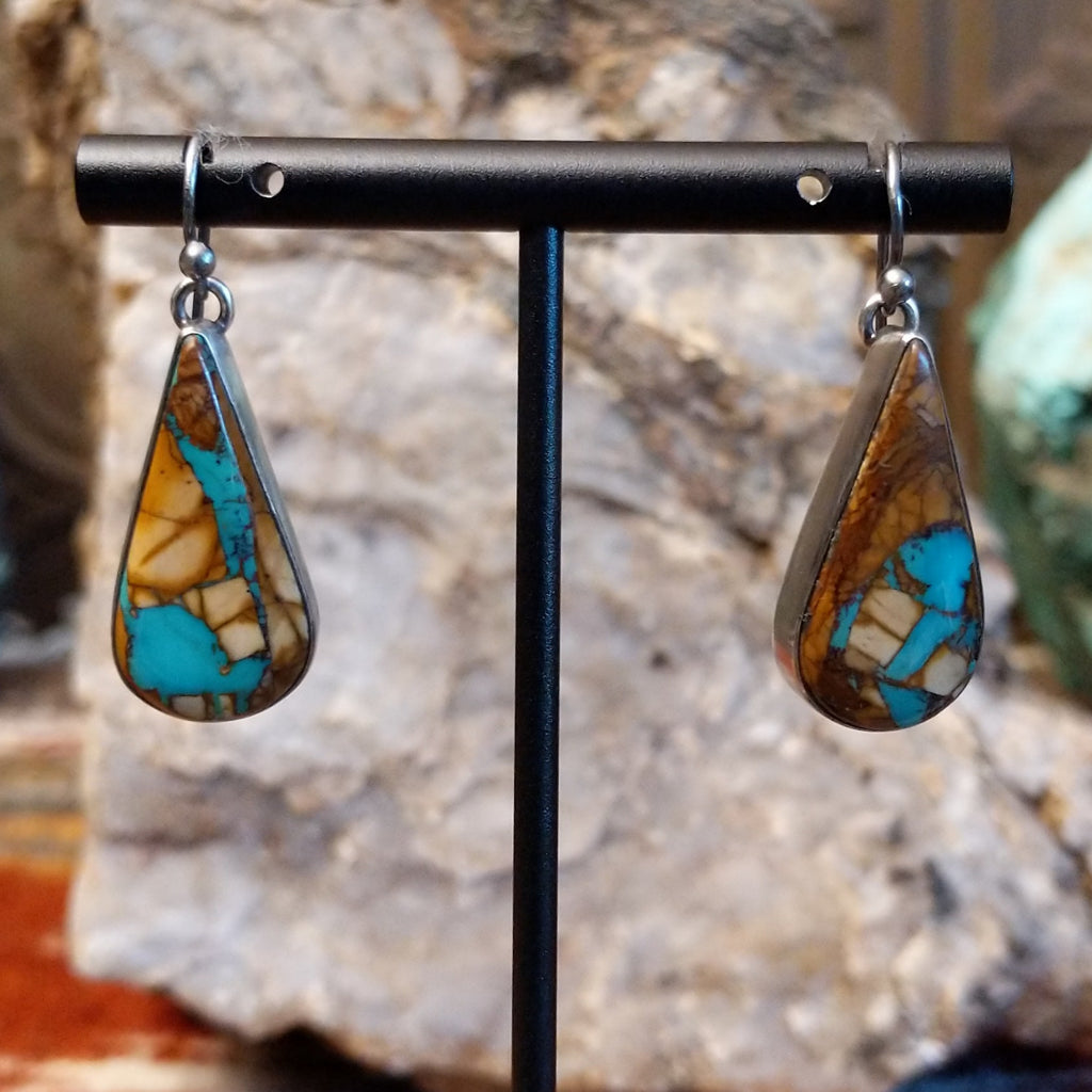 Large teardrop shaped earrings with boulder turquoise set in the bezels.