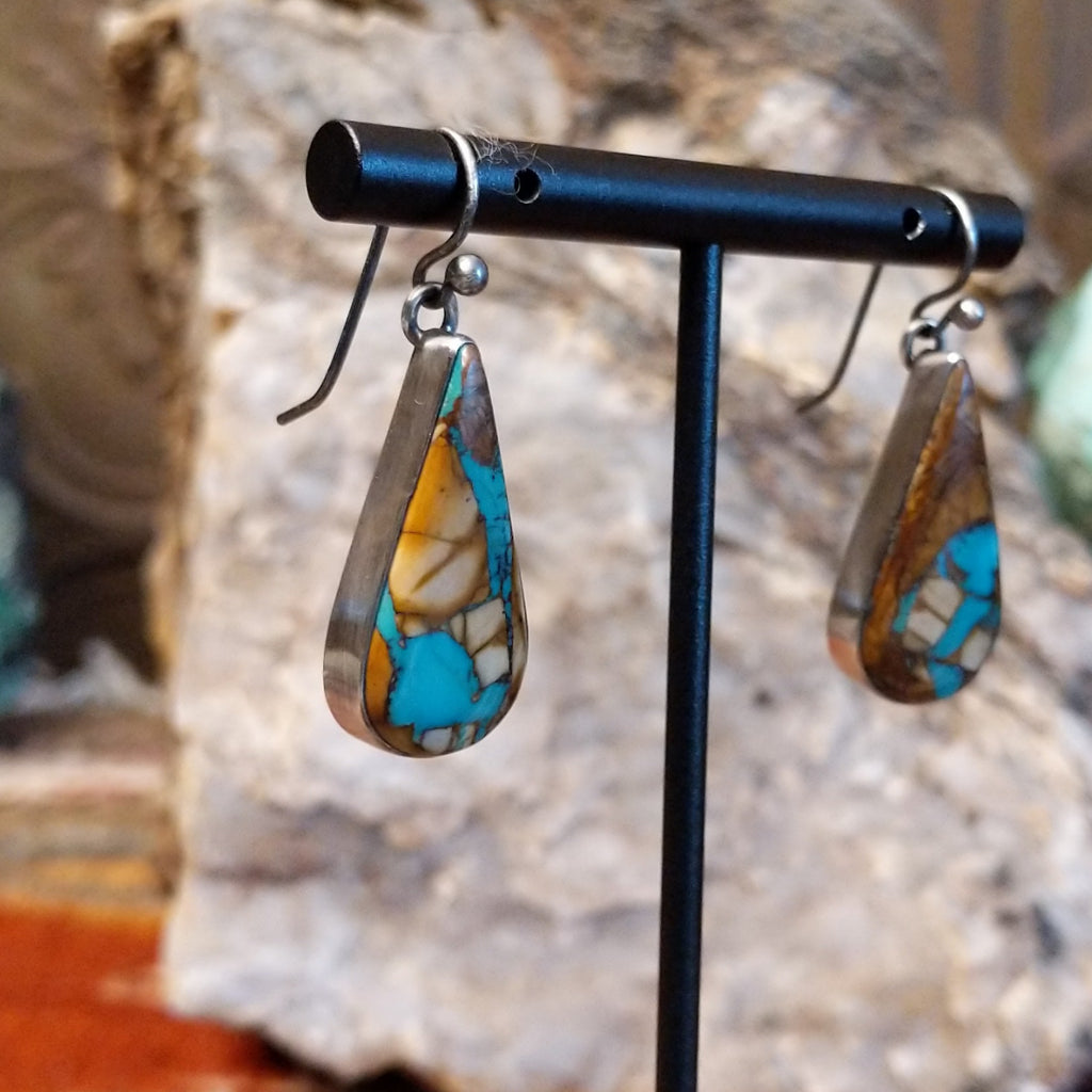 Large teardrop shaped earrings with boulder turquoise set in the bezels.
