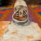 Large Charoite Ring by Sharon Francisco featuring an elongated purple charoite stone with natural swirling patterns, framed by twisted rope detailing and set in Sterling Silver; underside view.