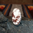 The front of the oval ring set in silver.