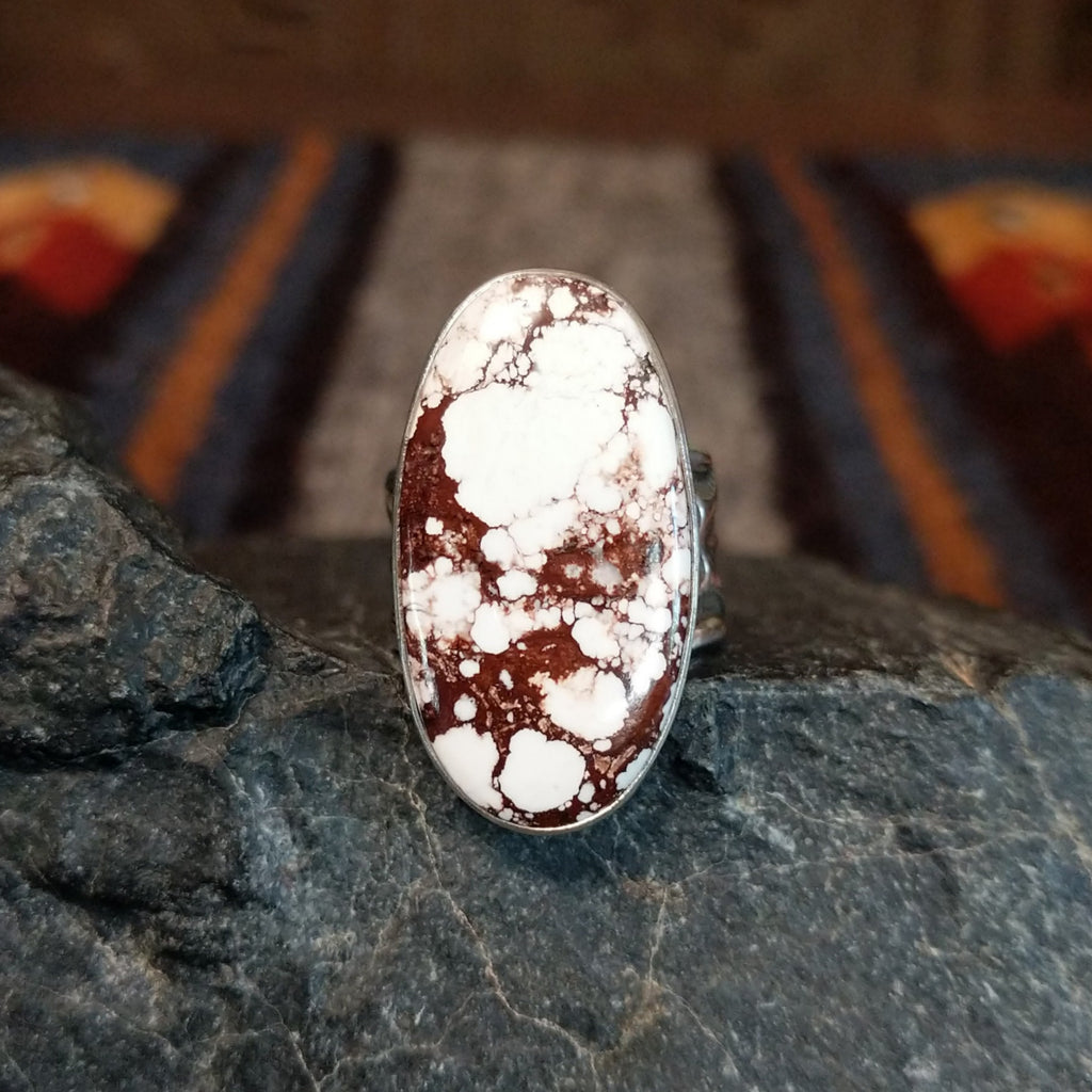 The front of the oval ring set in silver.