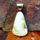 Sterling silver pendant with palomino variscite set in the bezel.