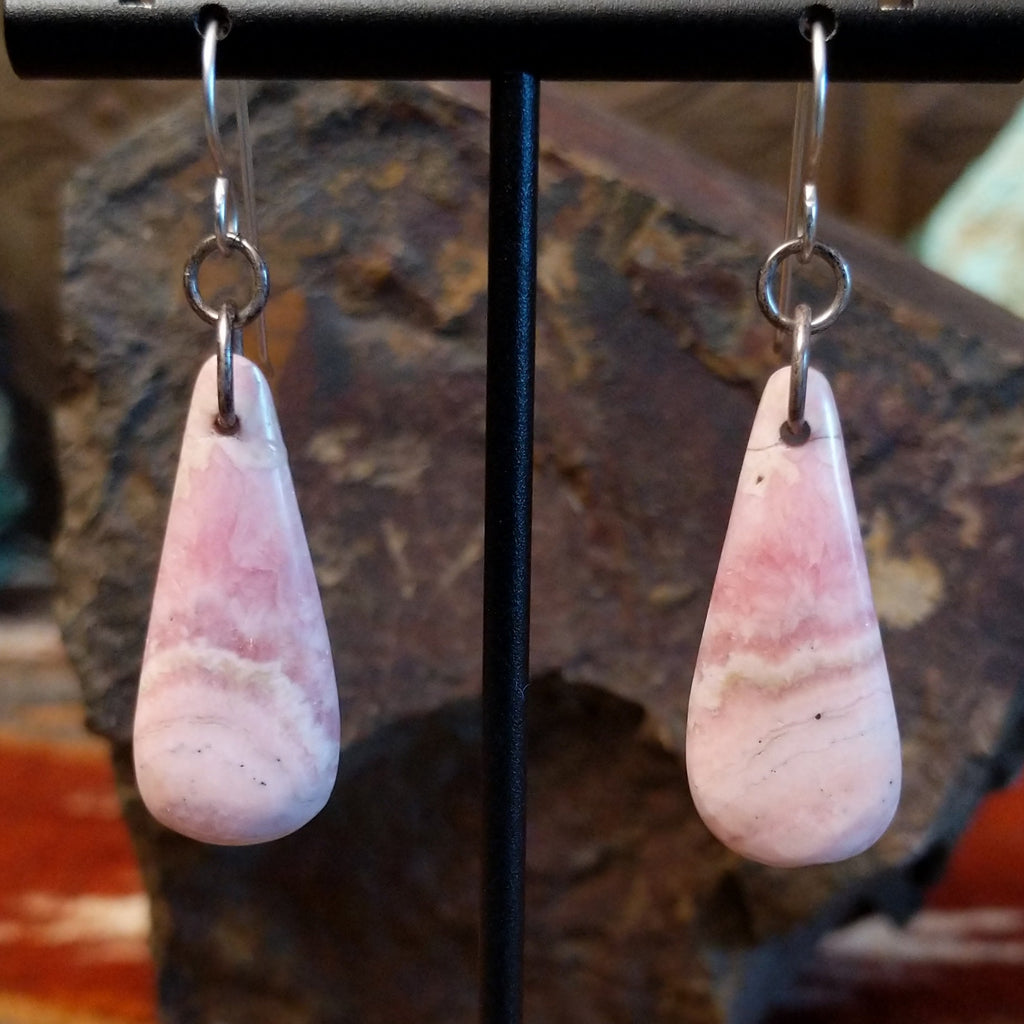 Teardrop shaped rhodochrosite earrings with dangle hooks.