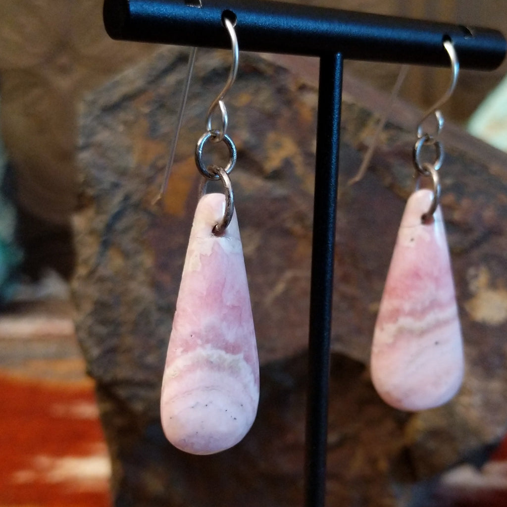 Teardrop shaped rhodochrosite earrings with dangle hooks.