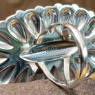 Large stamped sterling silver ring by Charles Johnson, featuring intricate hand-stamped patterns on a bold polished silver band with traditional Southwestern-inspired craftsmanship.  Artisan and Sterling Silver stamp.