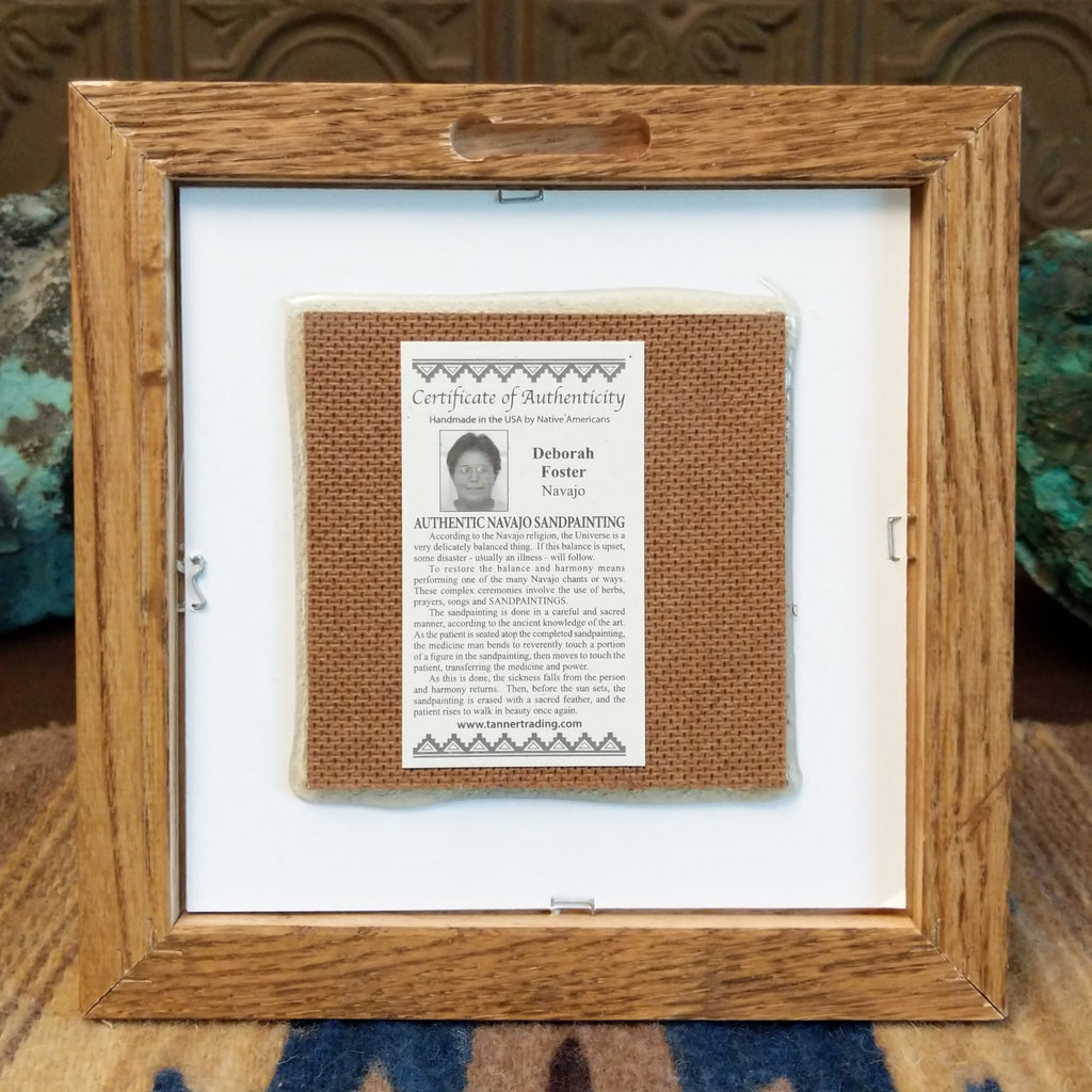 The back is simple with a place to hang the painting and authentication tag.