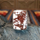 Large wild horse stone set in serrated bezel.