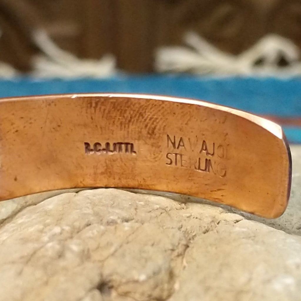 Close-up of the artisan's signature.