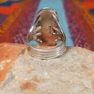 Long Oval Wild Horse Ring by John King featuring a large Wild Horse stone with brown, rust, cream, and white matrix set in Sterling Silver with detailed silverwork and a split-shank band; underside view.