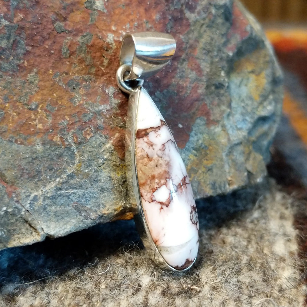 Wild horse stone set in a long teardrop sterling silver bezel.