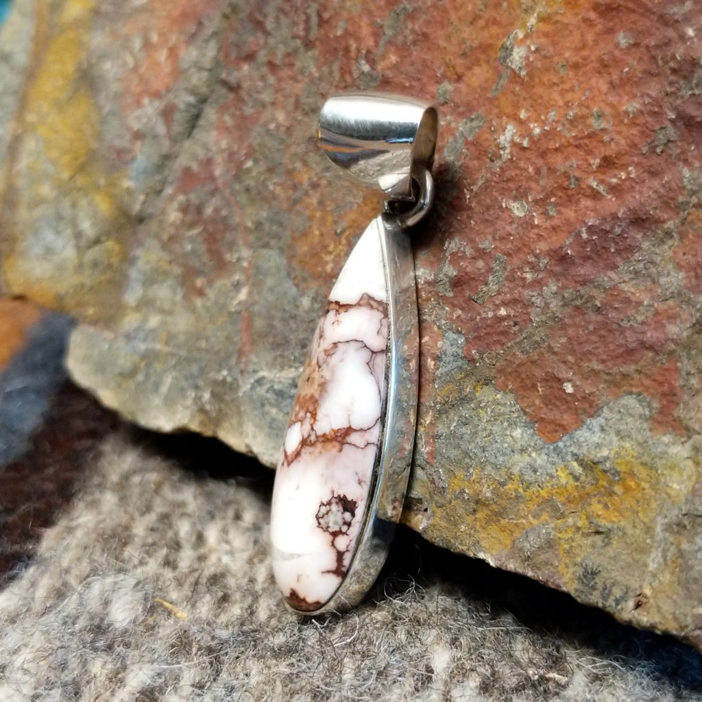 Wild horse stone set in a long teardrop sterling silver bezel.