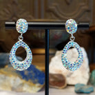 Austrian crystal loop earrings with multicolored crystals and sterling silver.