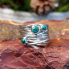 Layered sterling silver ring with malachite set in the bezels.