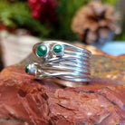 Layered sterling silver ring with malachite set in the bezels.