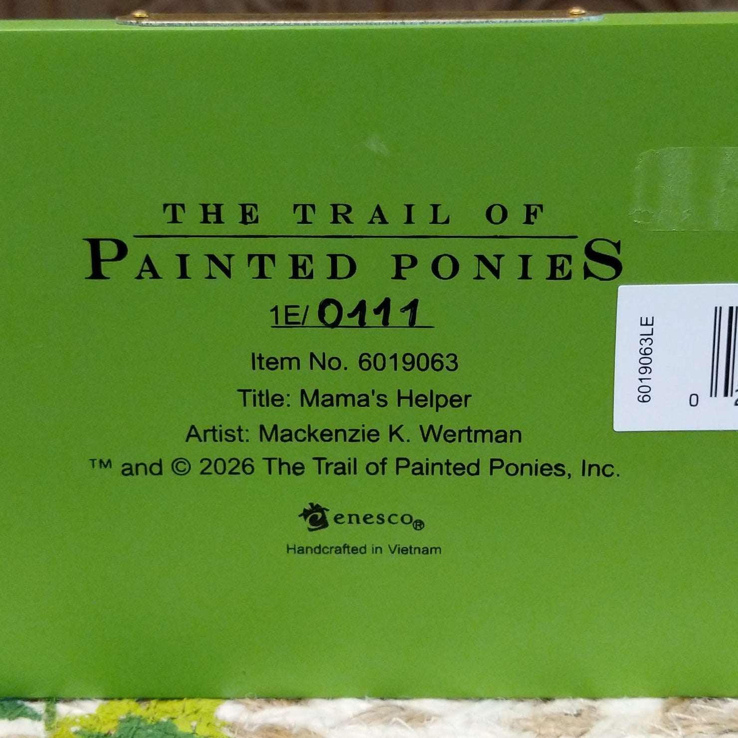 "Mama's Helper" collectible pony by The Trail of Painted Ponies, featuring detailed hand-painted artwork, vibrant colors, and family-inspired design elements.  Production number.
