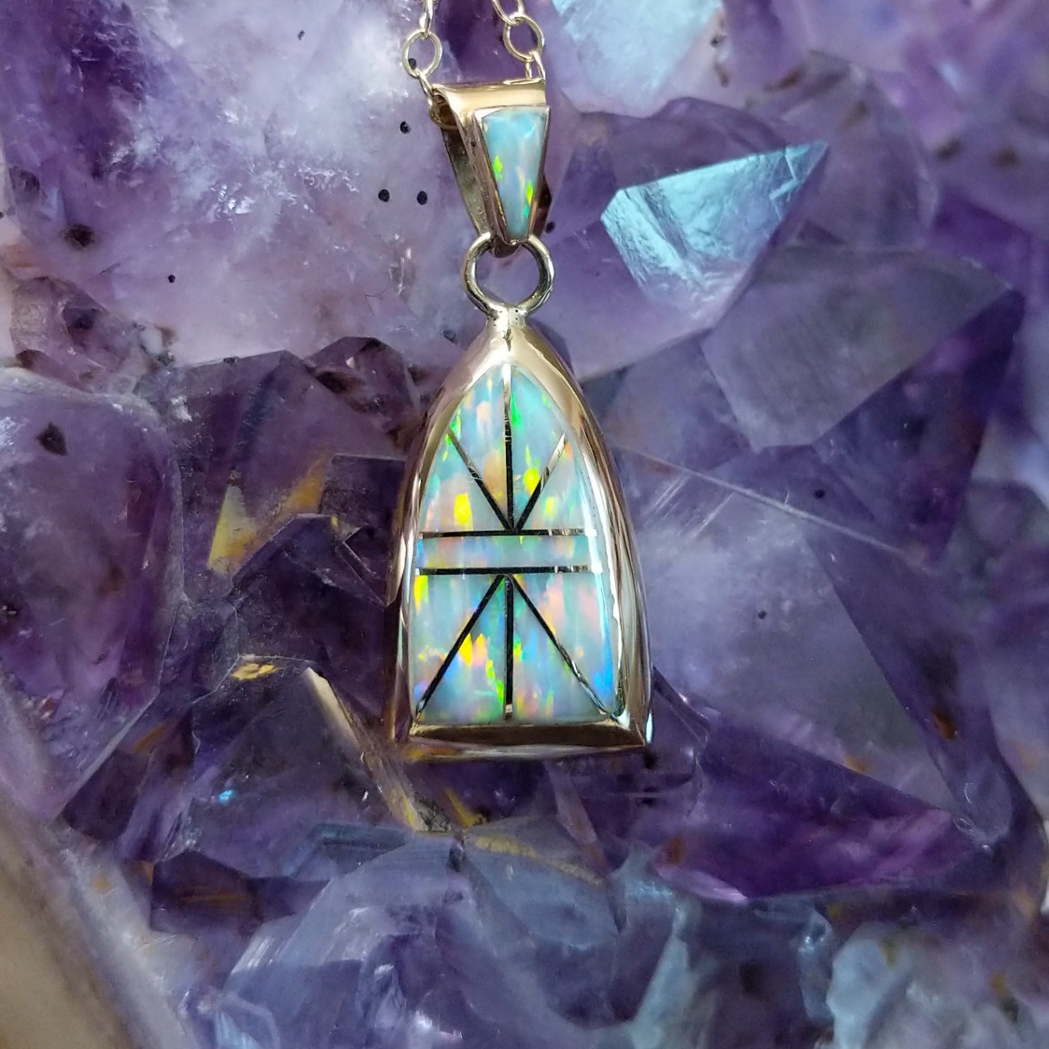 14kt gold Donald Douglas arch pendant with geometric manmade opal inlay and opal bail.