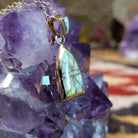 14kt gold Donald Douglas arch pendant with geometric manmade opal inlay and opal bail.