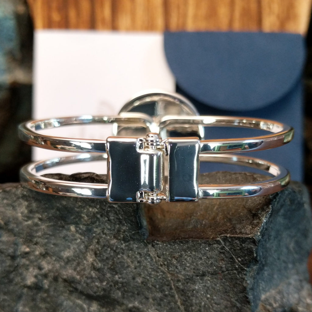 The back of the cuff features a clasp.