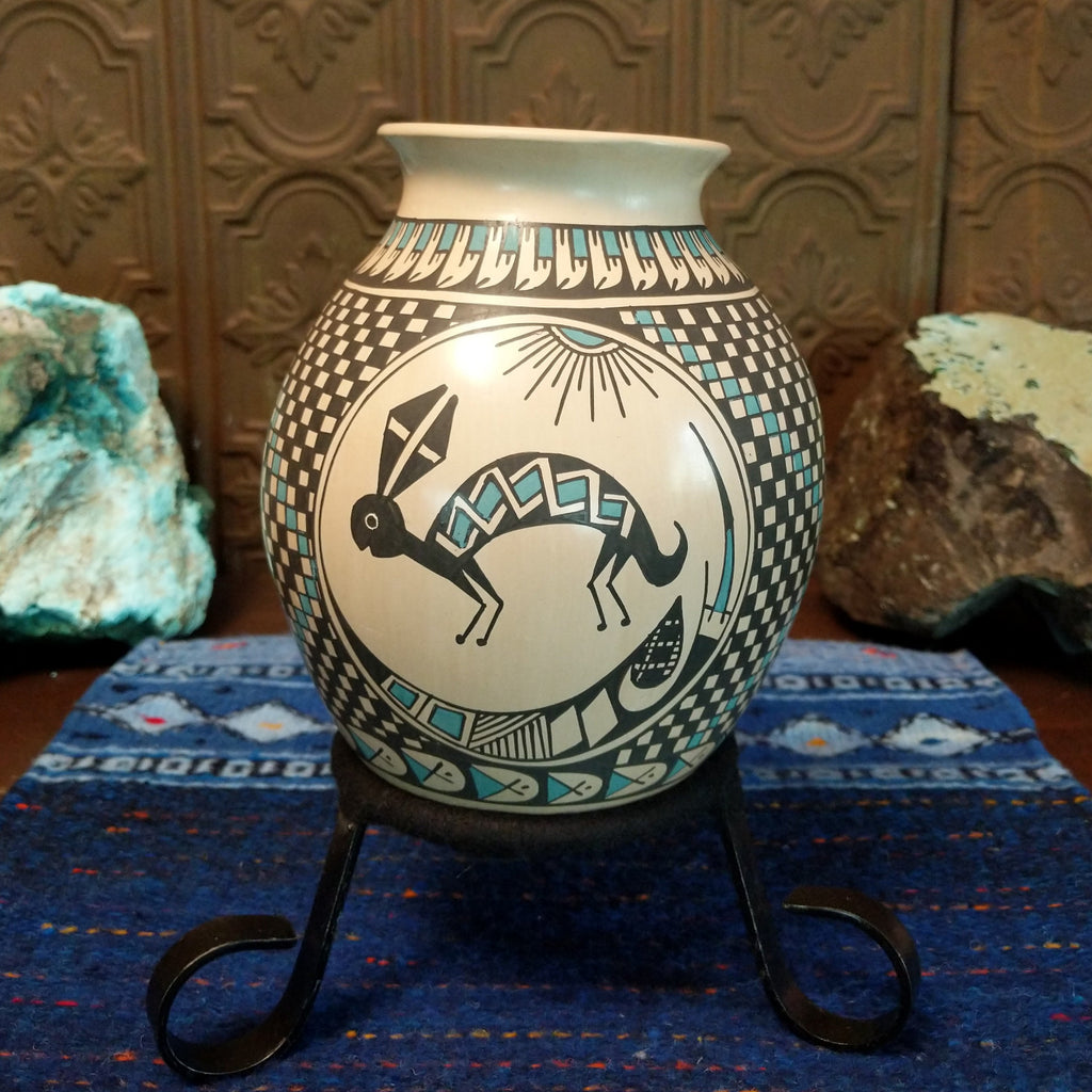 Clay pot featuring a rabbit motif.