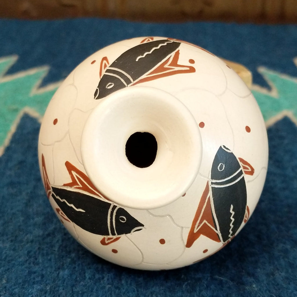 The top of the lip is smooth and tapered.