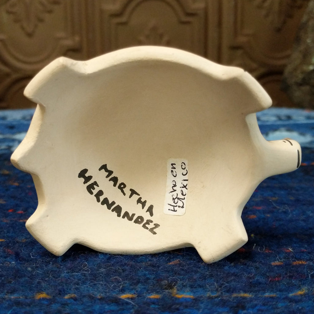 Artisan's signature is on the bottom of the turtle pottery.