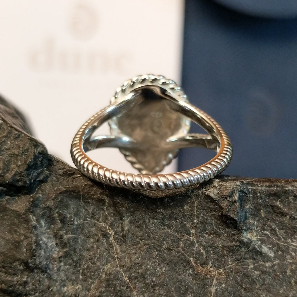 The back of the ring showcases the intricate twisted band.