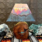Mesquite wood base showcases natural turquoise inlays, topped with a copper shade.