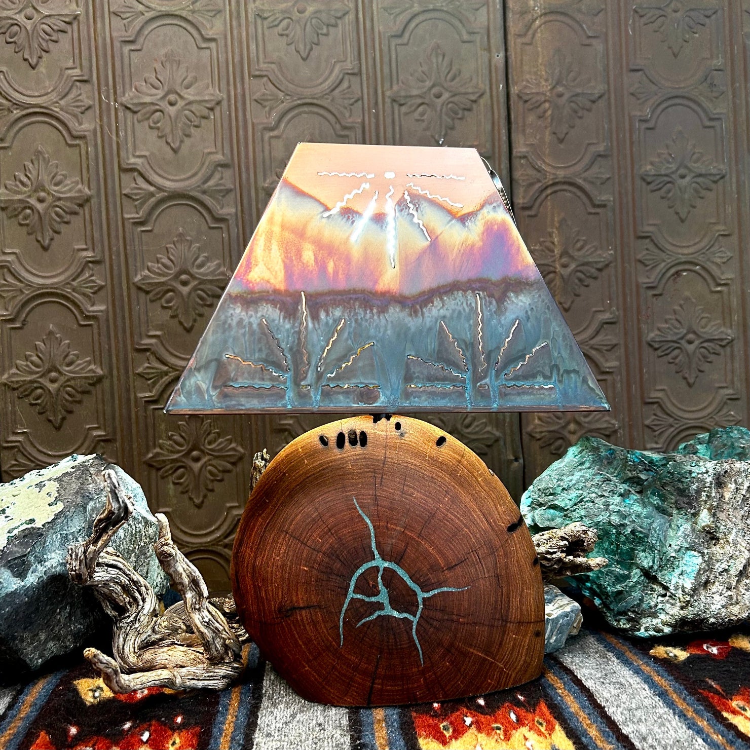 Mesquite wood base showcases natural turquoise inlays, topped with a copper shade.