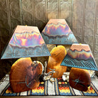 Mesquite wood base showcases natural turquoise inlays, topped with a copper shade.