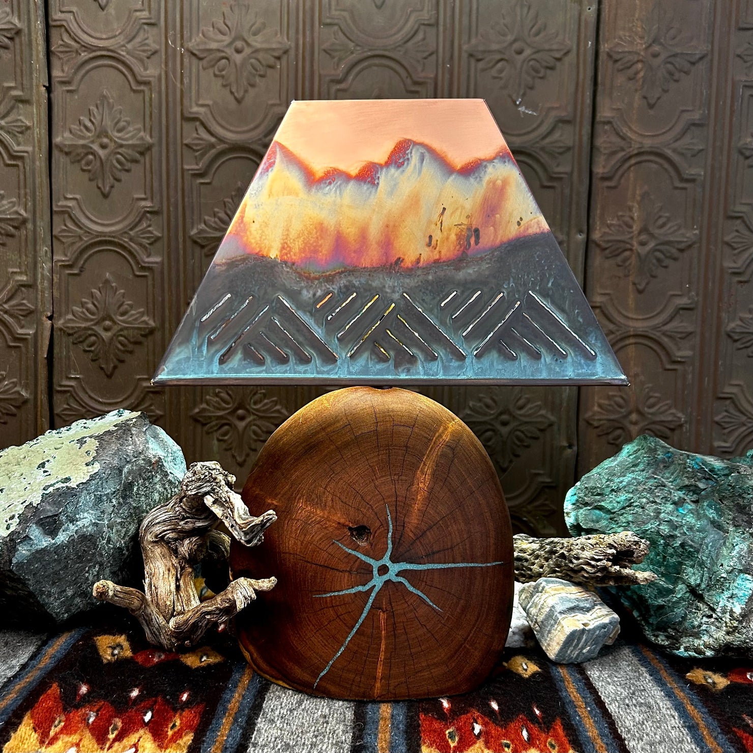 Mesquite wood base showcases natural turquoise inlays, topped with a copper shade.
