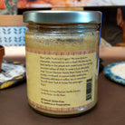 Jar of Mexican Vanilla Bean Honey made with pure honey infused with real Mexican vanilla bean. Golden honey with visible vanilla bean specks, ideal for sweetening beverages, desserts, and breakfast favorites.