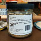Jar of Mexican Vanilla Bean Sugar featuring fine sugar blended with real vanilla bean specks. Gourmet sweetener with the rich aroma and smooth flavor of authentic Mexican vanilla, ideal for baking and beverages.