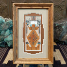 Framed Navajo sand painting of Mother Earth with plant and earth motifs. 