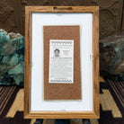 Backside of the Mother Earth sand painting, showing the Certificate of Authenticity and Artist information. 
